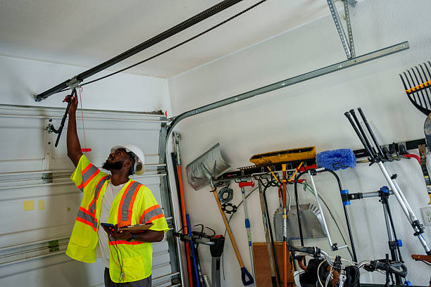 Professional Garage Door Panel Replacement technician working in Atlantic, IA